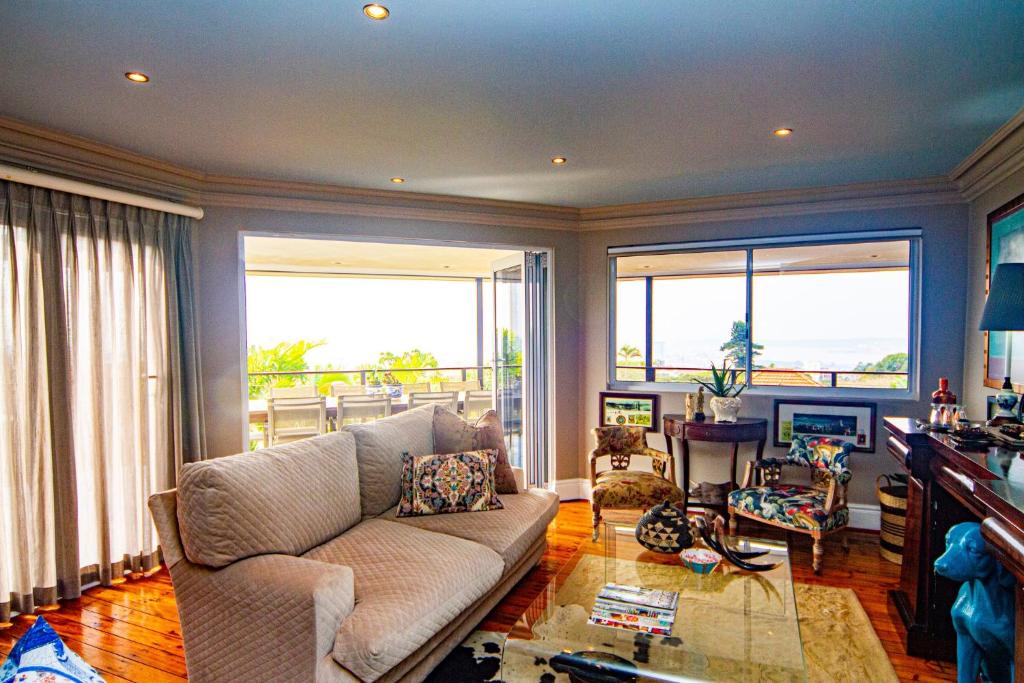 “A bright and airy living space with big windows that invite in fresh air, natural light, and beautiful harbour views.”